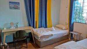 Letto o letti in una camera di DONG’HOME东东小院