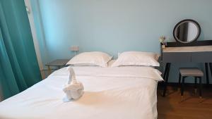 Letto o letti in una camera di DONG’HOME东东小院
