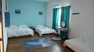 Letto o letti in una camera di DONG’HOME东东小院