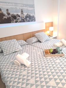 A bed or beds in a room at Villa Las Tres J