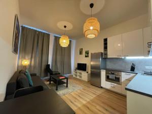 Kuchyň nebo kuchyňský kout v ubytování Andrews Cosy Apartment
