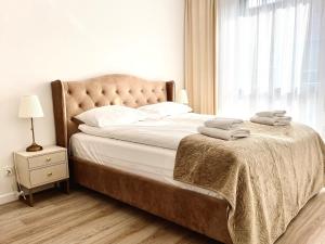 Posteľ alebo postele v izbe v ubytovaní Flatbook - Old Town Deluxe Apartments with Sauna and Parking
