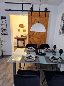 Posezení v ubytování Ferienwohnung Waldliebe Hinterweidenthal + 13 fotografií