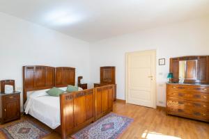 Posteľ alebo postele v izbe v ubytovaní Il Castellaro Country House