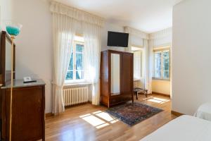 Posteľ alebo postele v izbe v ubytovaní Il Castellaro Country House