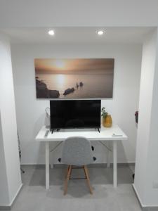 Et tv og/eller underholdning på Holiday House Monalisa