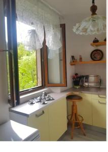 A kitchen or kitchenette at Fuga in montagna Casa indipendente mezzo montagna con barbecue