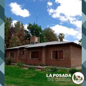 a brick house with a chimney on top of it at La Posada De Cacho in San Rafael