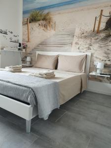 Postel nebo postele na pokoji v ubytování b&b Casa Balai 72 a 100 mt dal mare