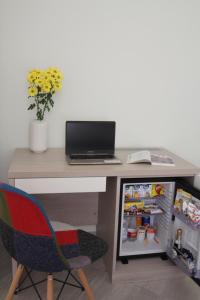 A television and/or entertainment centre at Maison Carolina