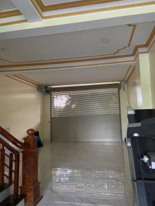 an empty room with a window in a room at Tiny home 小角落 in Tam Ðảo