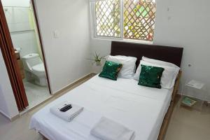 Cama ou camas em um quarto em Casa en Cartagena para disfrutar