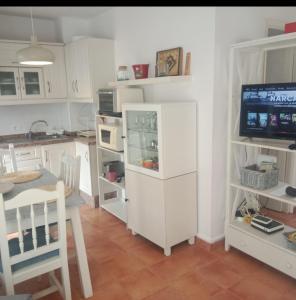 Kuchyňa alebo kuchynka v ubytovaní Confortable apartamento en los Cancajos