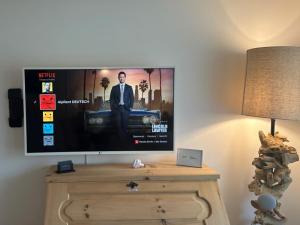 TV a/nebo společenská místnost v ubytování Natur, Erholung, moderne 35m2, mit Parkplatz - SP19