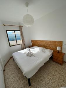 Posteľ alebo postele v izbe v ubytovaní El Olivar Corralejo Beach