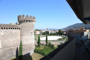 a view of a castle from a balcony at The APARTMENT in Tivoli