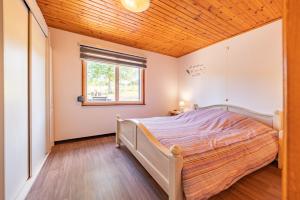 Postel nebo postele na pokoji v ubytování Gite Haven