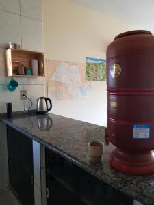 a mixer sitting on a counter in a kitchen at Abrigo Serafina#cama&café in Itamonte