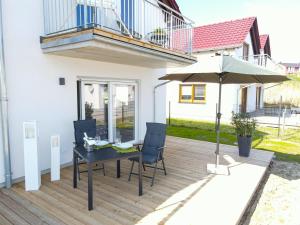 Balkón nebo terasa v ubytování Geiseltalsee Haus am See mit Wallbox