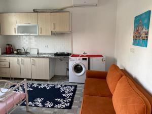 Kuchyň nebo kuchyňský kout v ubytování Imroz Kite Pansiyon& Guest House