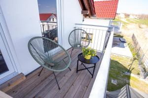 Balkón nebo terasa v ubytování Geiseltalsee Haus am See mit Wallbox