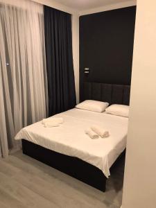 Letto o letti in una camera di Hotel Niko