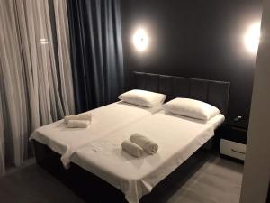 Letto o letti in una camera di Hotel Niko