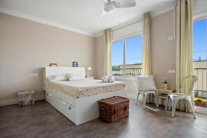 Posteľ alebo postele v izbe v ubytovaní Hauzify I Casa d'Anselm Clavé