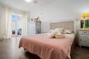 Posteľ alebo postele v izbe v ubytovaní Hauzify I Casa d'Anselm Clavé