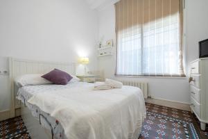 Posteľ alebo postele v izbe v ubytovaní Hauzify I Casa d'Anselm Clavé