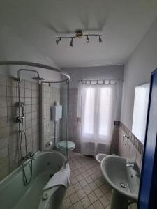 A bathroom at Borgo Antico Apartments