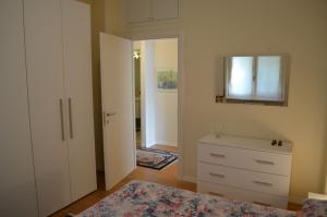 A bed or beds in a room at B&B Paradisett