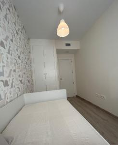 Łóżko lub łóżka w pokoju w obiekcie BAJO GUÍA DELUXE