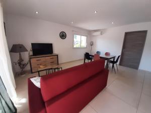 Un televizor și/sau centru de divertisment la Bel appartement Corse côte Est
