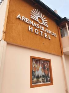 a sign on the side of aemedas blankets hotel at Hotel Arenas Blancas in Federación