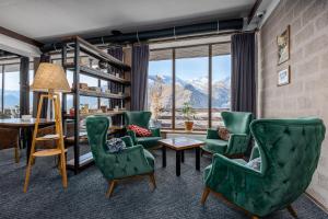 Istumisnurk majutusasutuses Alpine Lounge Boutique Hotel