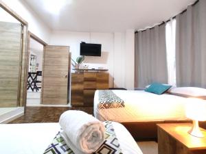TV a/nebo společenská místnost v ubytování Walena Hotel