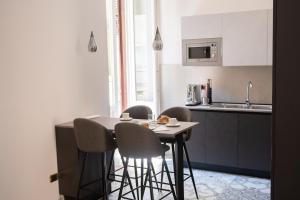 Kuchyň nebo kuchyňský kout v ubytování Lifestyle and Suites