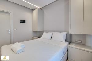 Postel nebo postele na pokoji v ubytování Norge Hotel