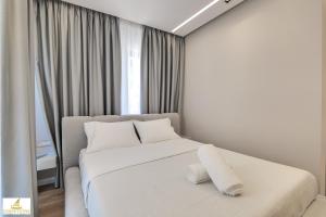 Postel nebo postele na pokoji v ubytování Norge Hotel