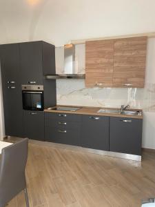 Köök või kööginurk majutusasutuses Via Alchimia 11