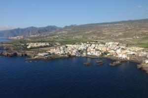 an aerial view of a town in the water at CASA ANA in Alcalá