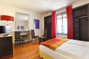 Katil atau katil-katil dalam bilik di Hotel Tor