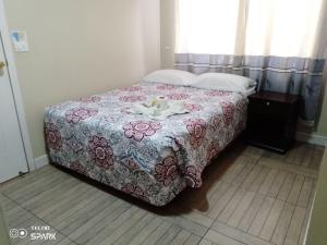 Letto o letti in una camera di HOSPEDAJE YACUCALLE