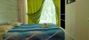 Letto o letti in una camera di HOSPEDAJE YACUCALLE