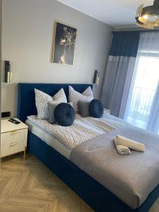 Ένα ή περισσότερα κρεβάτια σε δωμάτιο στο EXCLUSIVE APARTMENT