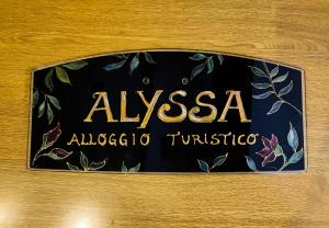 ein Schild mit der Aufschrift Ayssa Albuquerque Tucson in der Unterkunft ALYSSA SWEET DREAMS -Holidays House in Sora