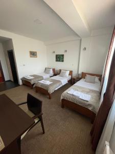 Ein Bett oder Betten in einem Zimmer der Unterkunft Garni hotel Niksic