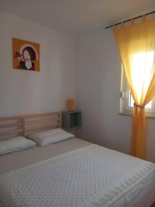 Postel nebo postele na pokoji v ubytování Apartment Red wine