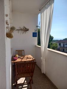 Balkón nebo terasa v ubytování Apartment Red wine